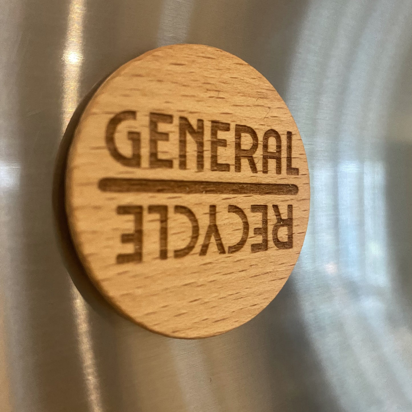Wooden recycling chore reminder dial attached to fridge, a stylish way to track bin day.
