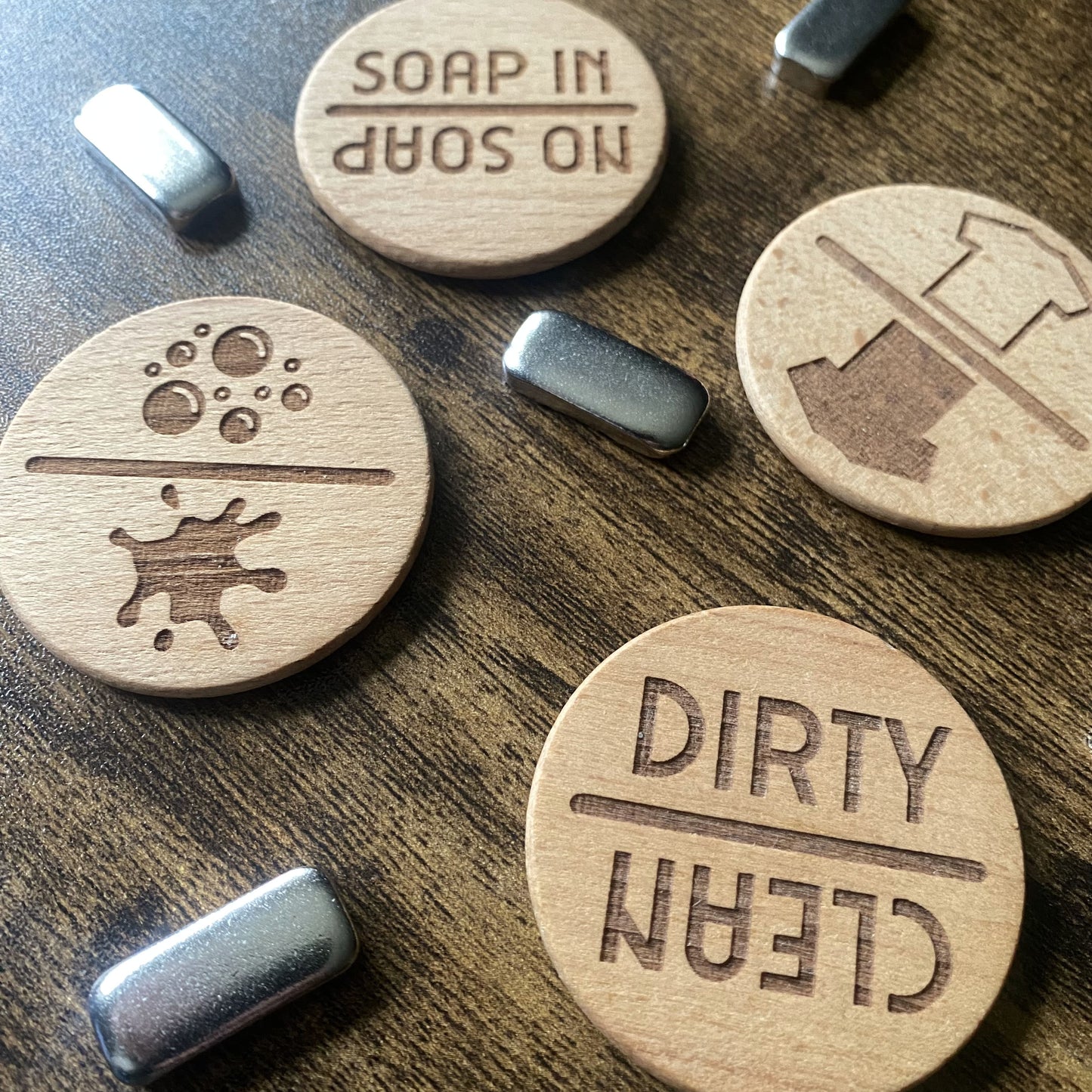 A stylish side-angle shot showing all Spinning Chore Reminder variations, featuring their unique buttons for easy placement.