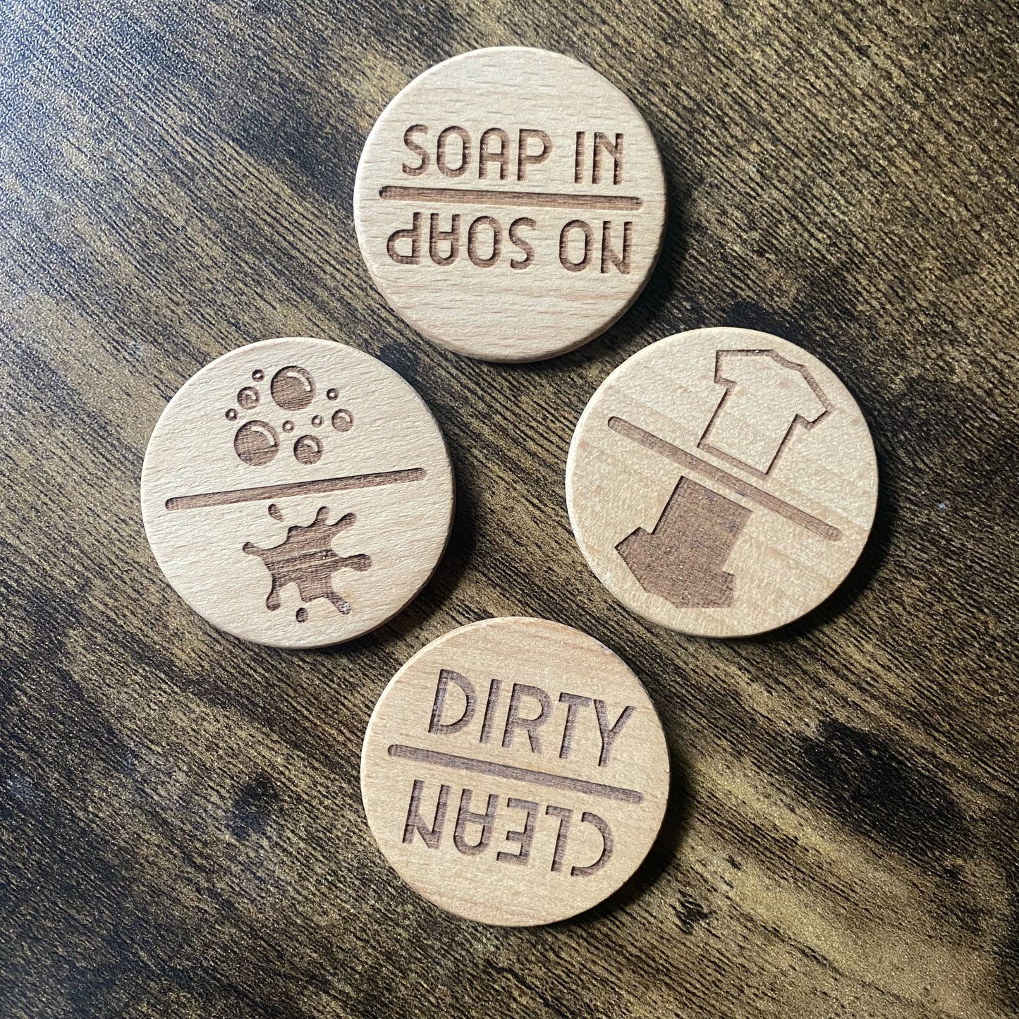 A top-down view showing all four Spinning Chore Reminders, each featuring unique designs for different laundry tasks.