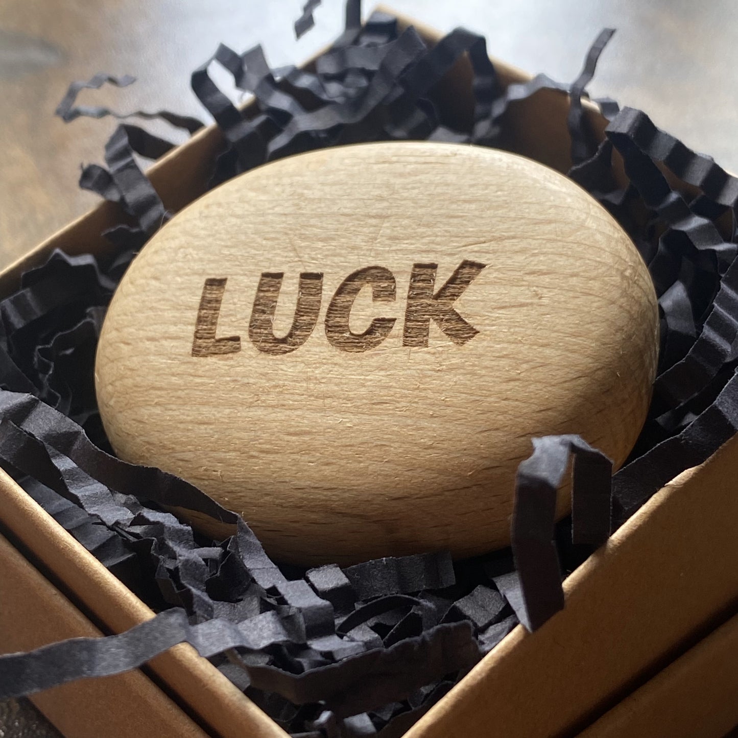 Affirmation pebble engraved with ‘Luck’ – crafted wooden gift in a presentation box for comfort and care