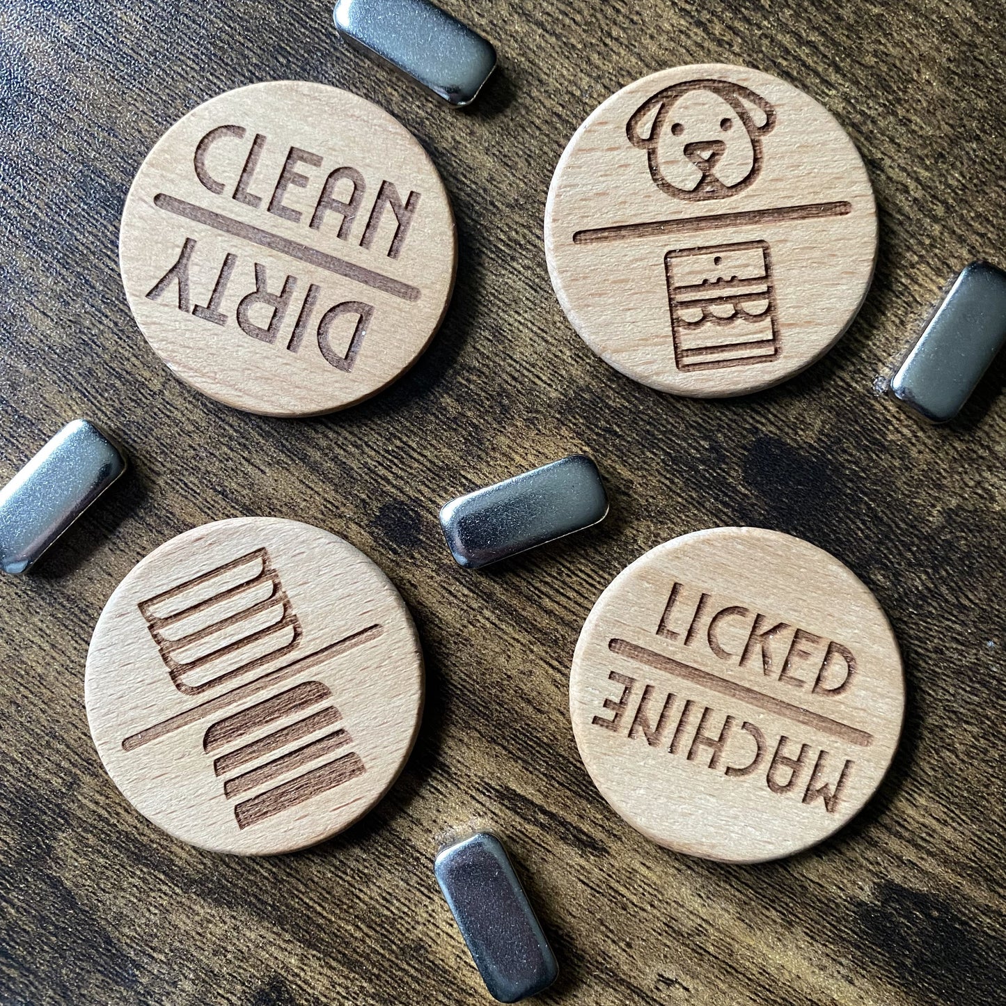 Top-down view of all four dishwasher spinner designs with adhesive buttons in alternate order