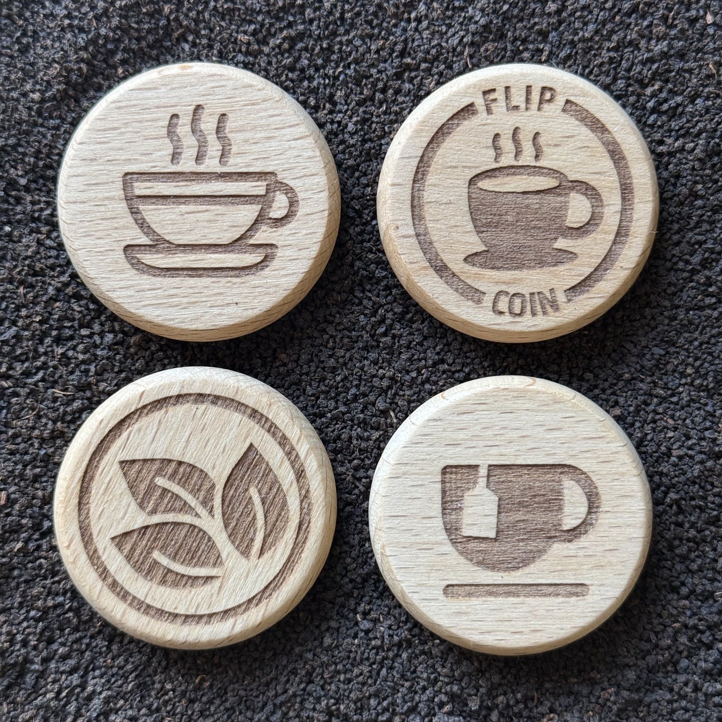 Four tea-themed designs of the Flip Coin – Tea or Coffee: Outline, Teabag, Steaming, and Beans
