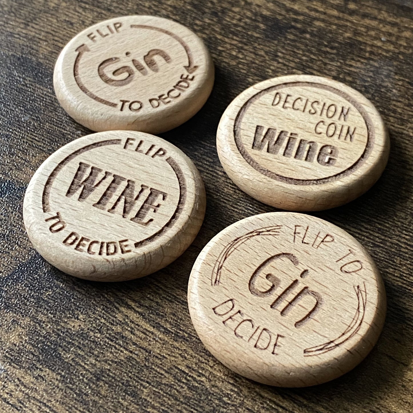 Four different Friday Night Drinking Trio Flip Coin designs shown side by side, with one coin featuring the engraved "Gin" and "Wine" decision