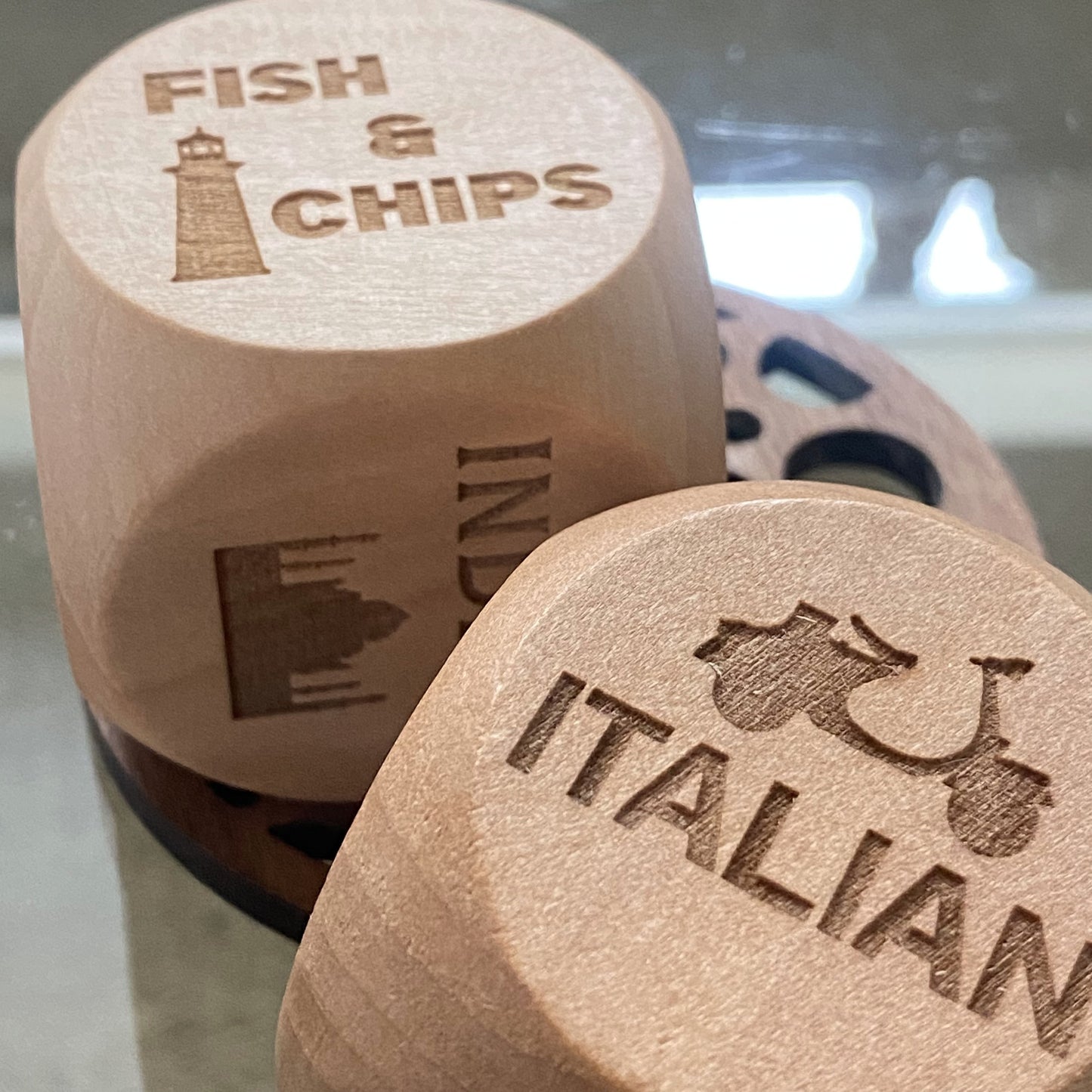 Takeout Decision Dice pair shown in a relaxed home environment, ready for dinner decision-making