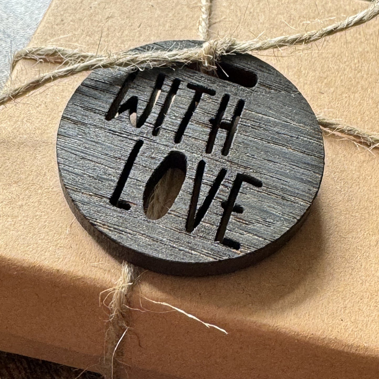 Wooden 'With Love' charm attached to a gift box – personalised decorative accessory