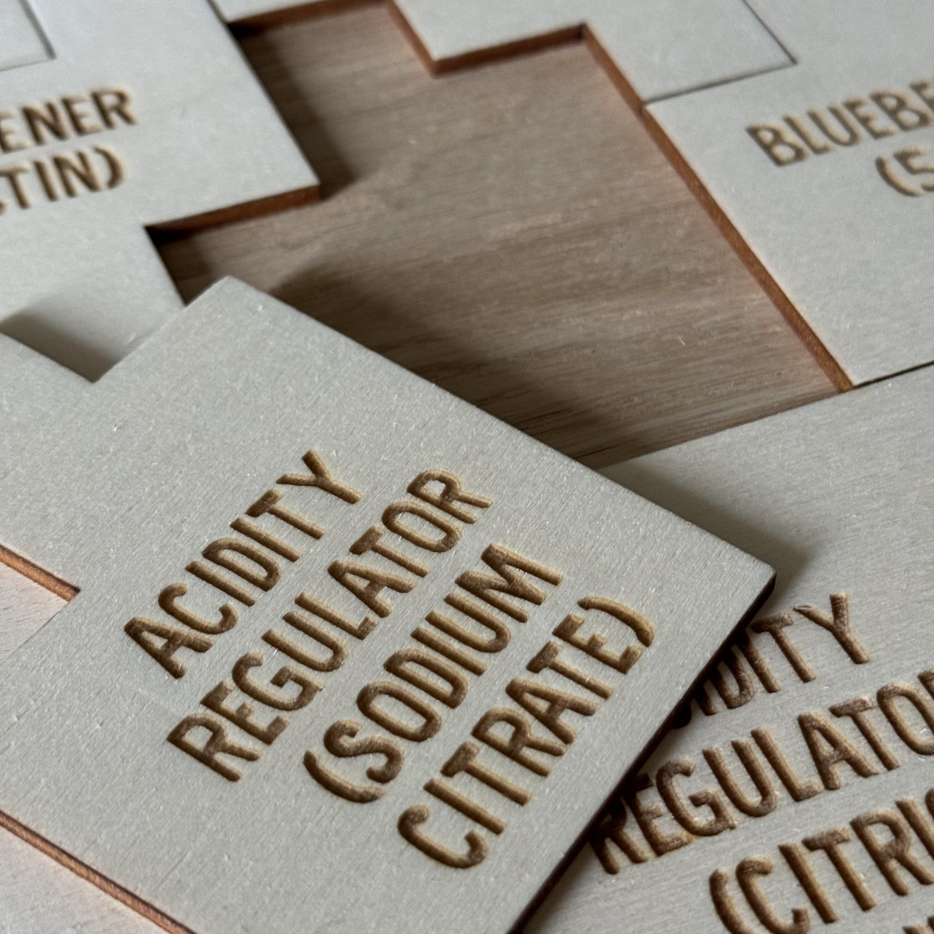 Custom engraved jigsaw for corporate presentation – educational puzzle illustrating yoghurt contents and ingredients