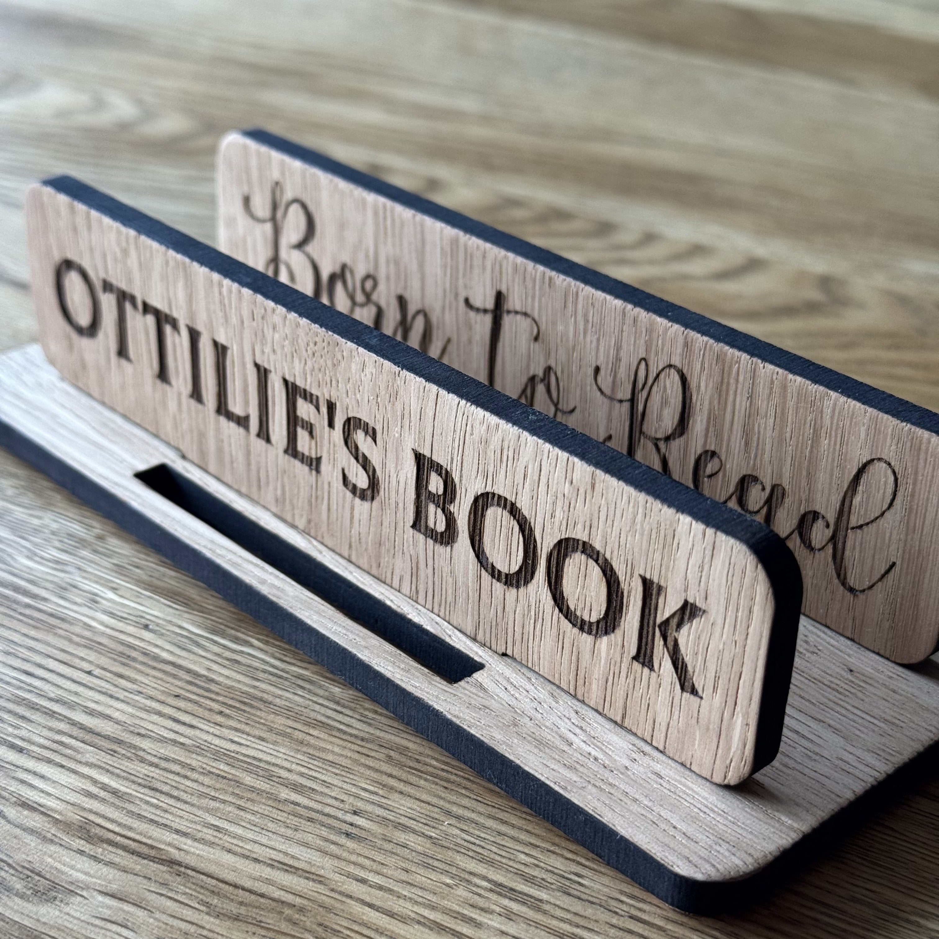 Personalised adjustable wooden book stand engraved with name and meaningful phrase – practical and thoughtful gift