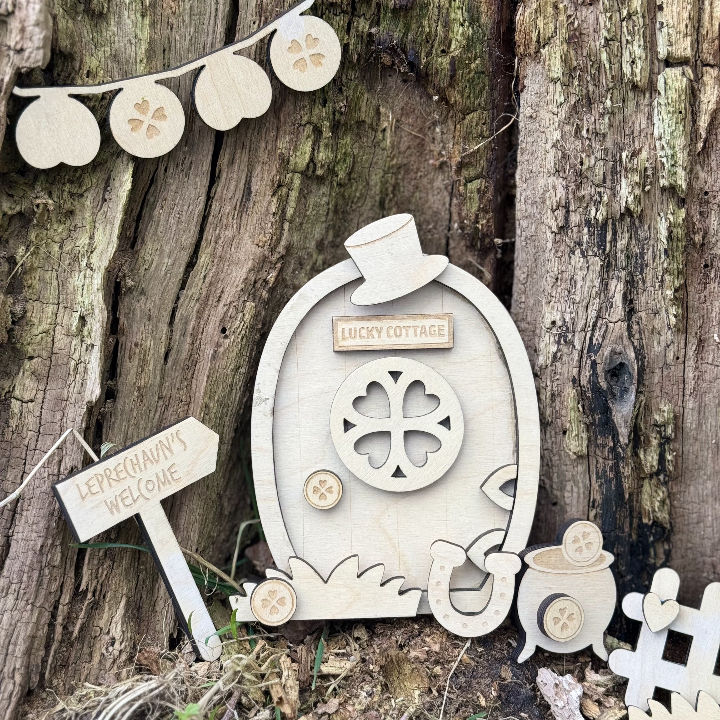 Intricately crafted bespoke wooden leprechaun door set into natural wood background