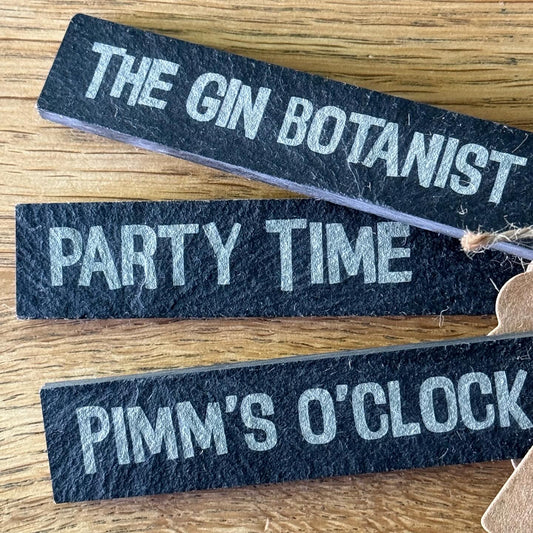 Party-themed slate plant markers shown top-down on oak, perfect for stylish gifts or table accessories for gatherings