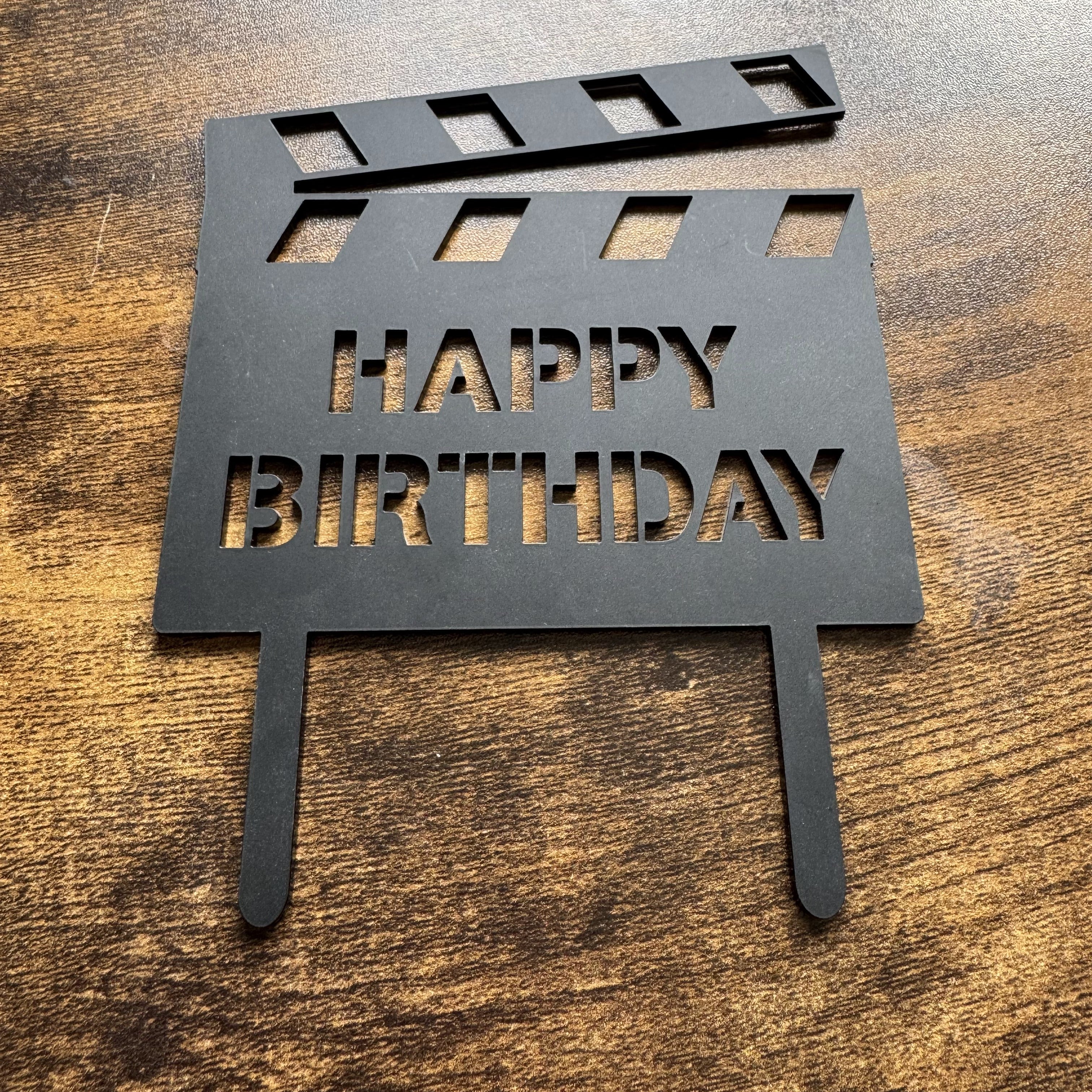 Acrylic clapper board cake topper, perfect for film-themed celebrations and parties