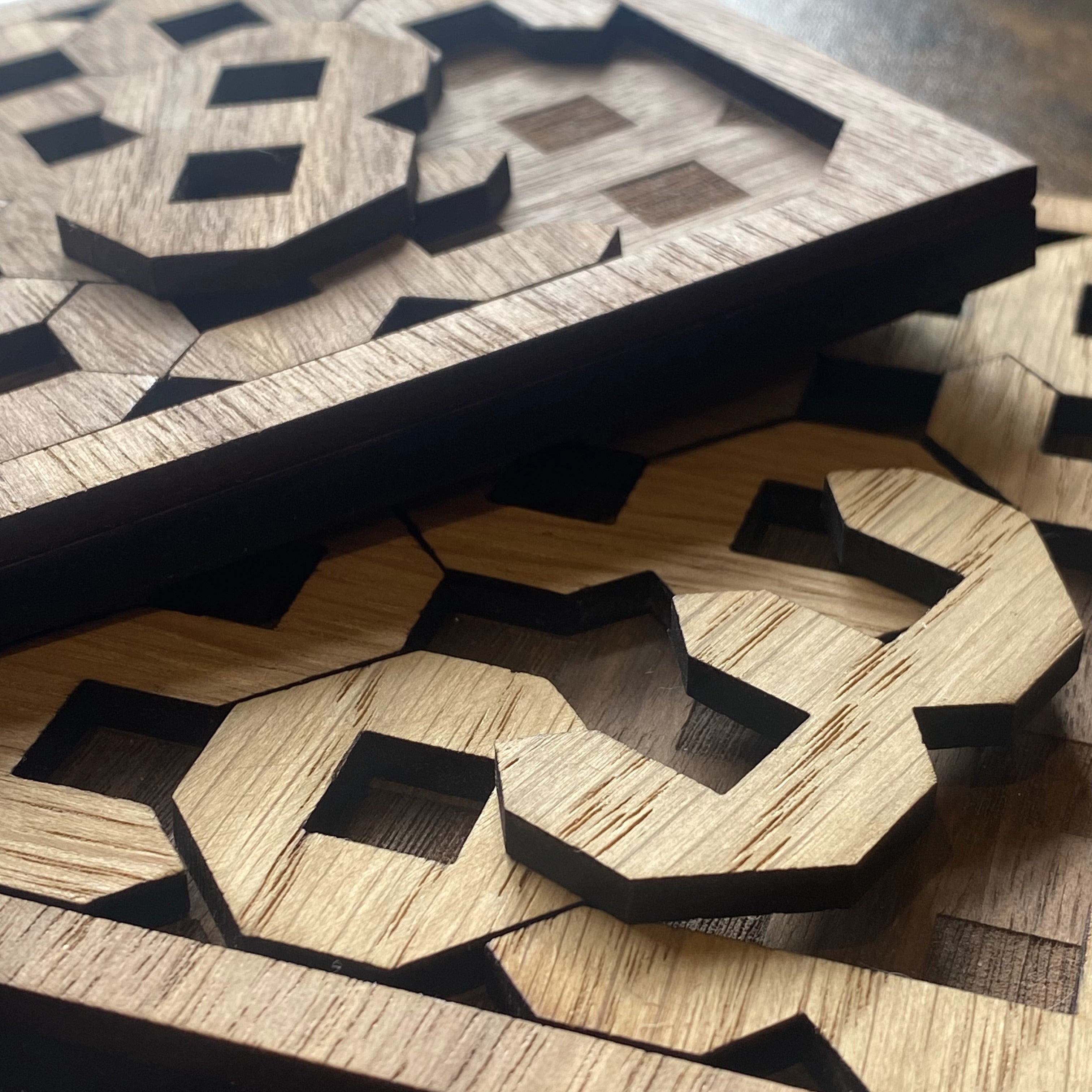 Close-up of wooden number puzzle pieces showing detailed engraving and tactile finish