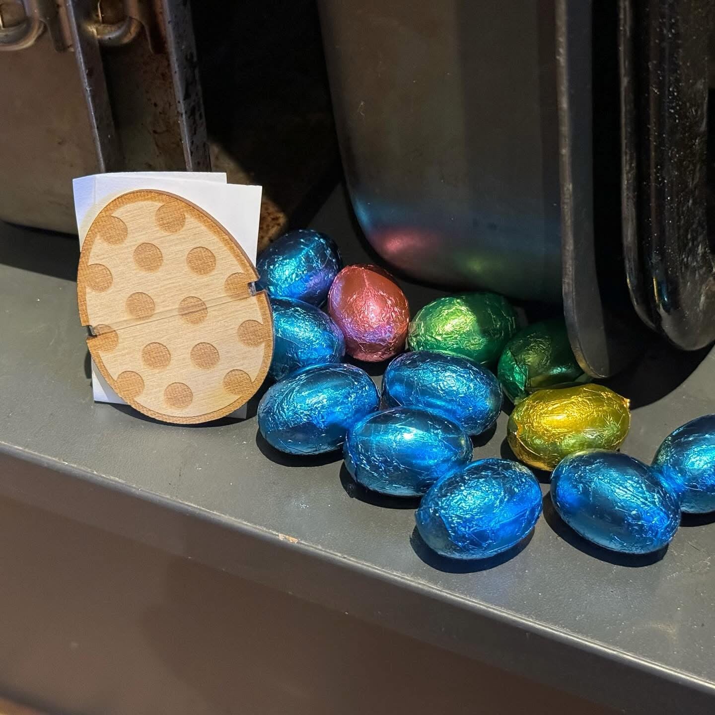 Engraved wooden token designed for Easter egg hunts, featuring playful seasonal details