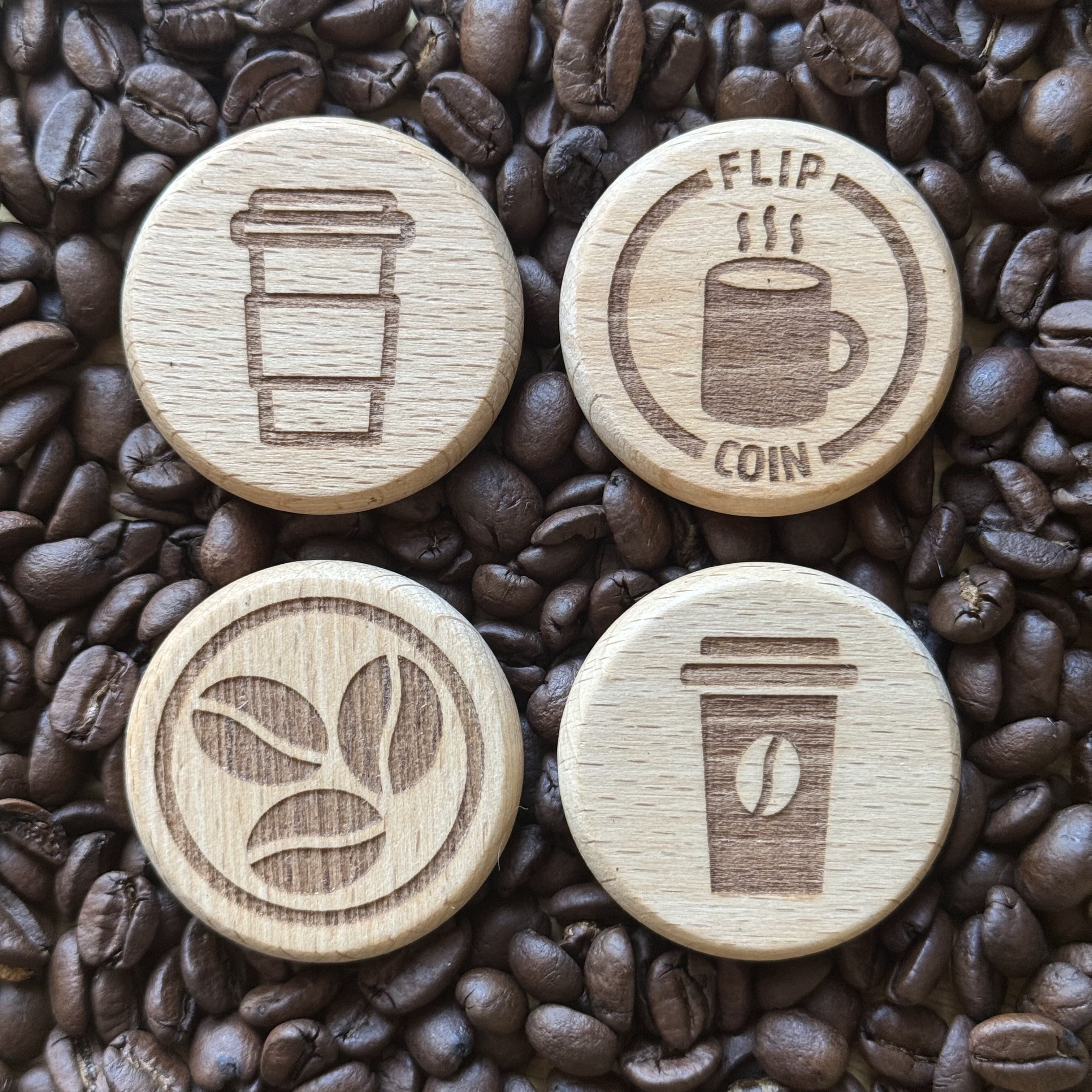 Four coffee-themed sides of the Flip Coin – Tea or Coffee: Outline, Beans, Teabag, and Steaming