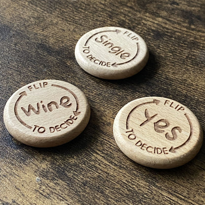 Close-up of the Arrow design on the Friday Night Drinking Trio Flip Coins, showing detailed wood engraving