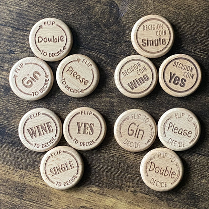Top-down view of the full Friday Night Drinking Trio Coin Set, featuring all three coins in each of the four unique engraved designs