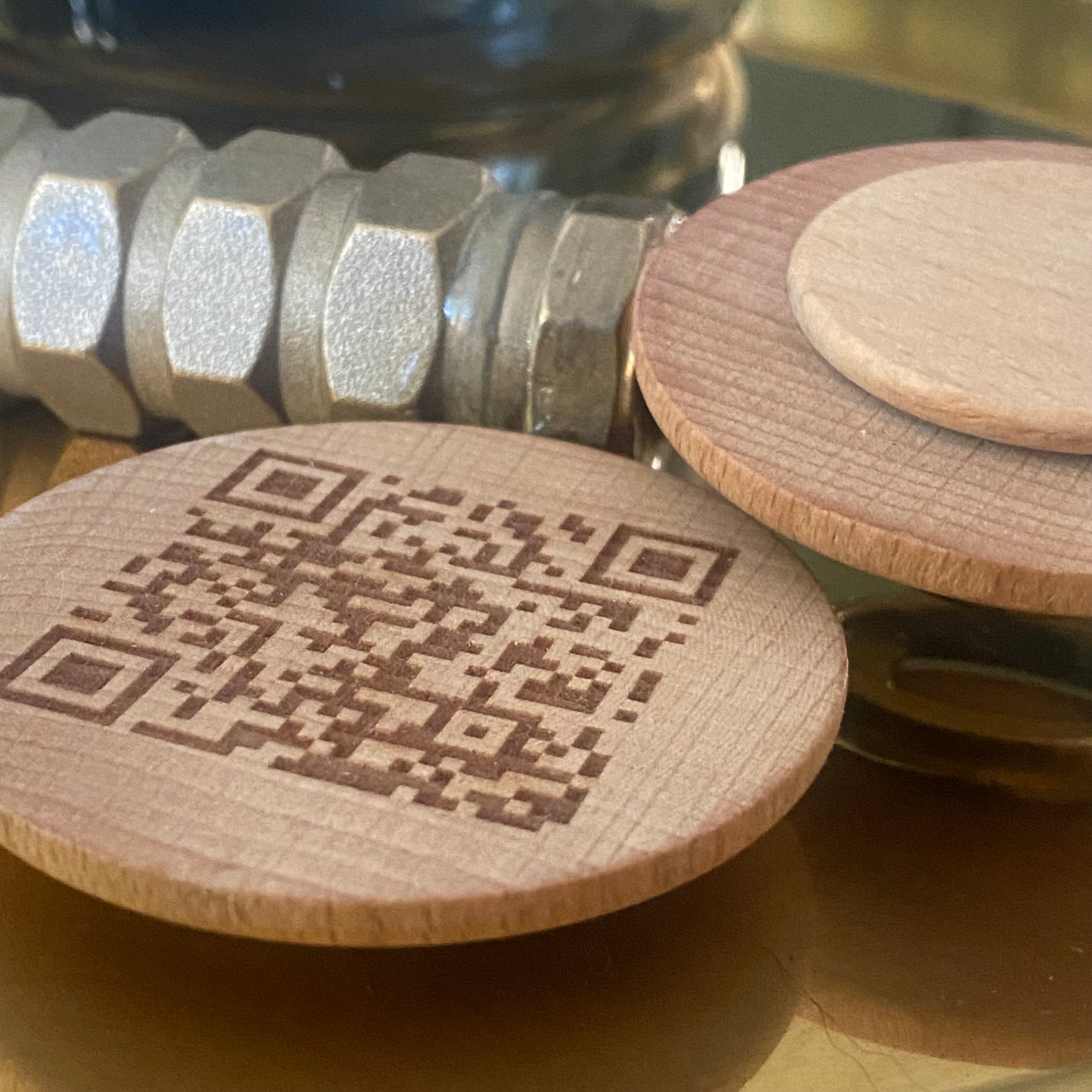Wooden clams engraved with home WiFi QR code and NFC tag for easy connectivity