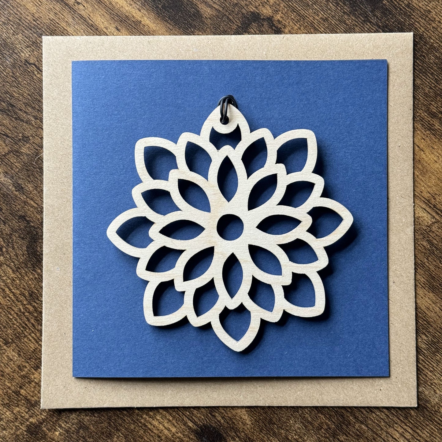 Keepsake Charm Card with intricately laser cut Mandala wooden charm, paired with a rich dark blue background and elegant shadow detailing