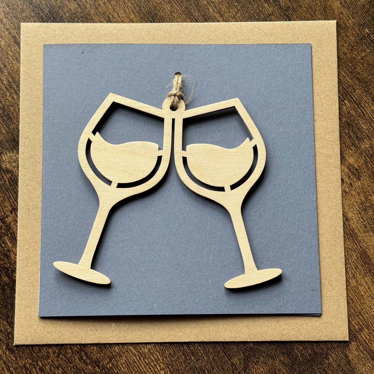 Wooden Keepsake Charm Card featuring Wine Glasses design – a celebratory charm card for special occasion gifting, with lasting hanging memento  