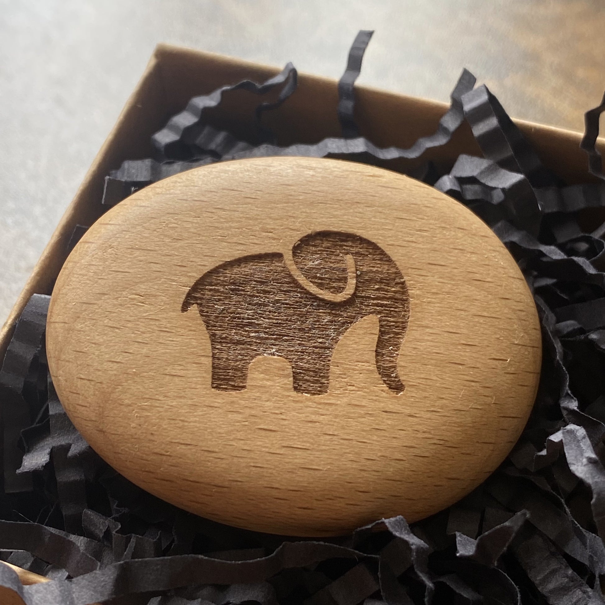 Good luck elephant engraved on wooden pocket pebble – meaningful charm in a presentation gift box