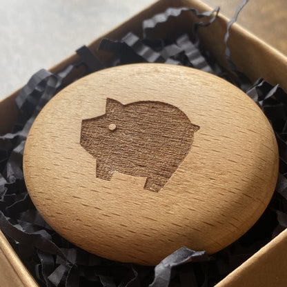Engraved wooden pebble with lucky pig design – good fortune charm from the Luck Edition in presentation box