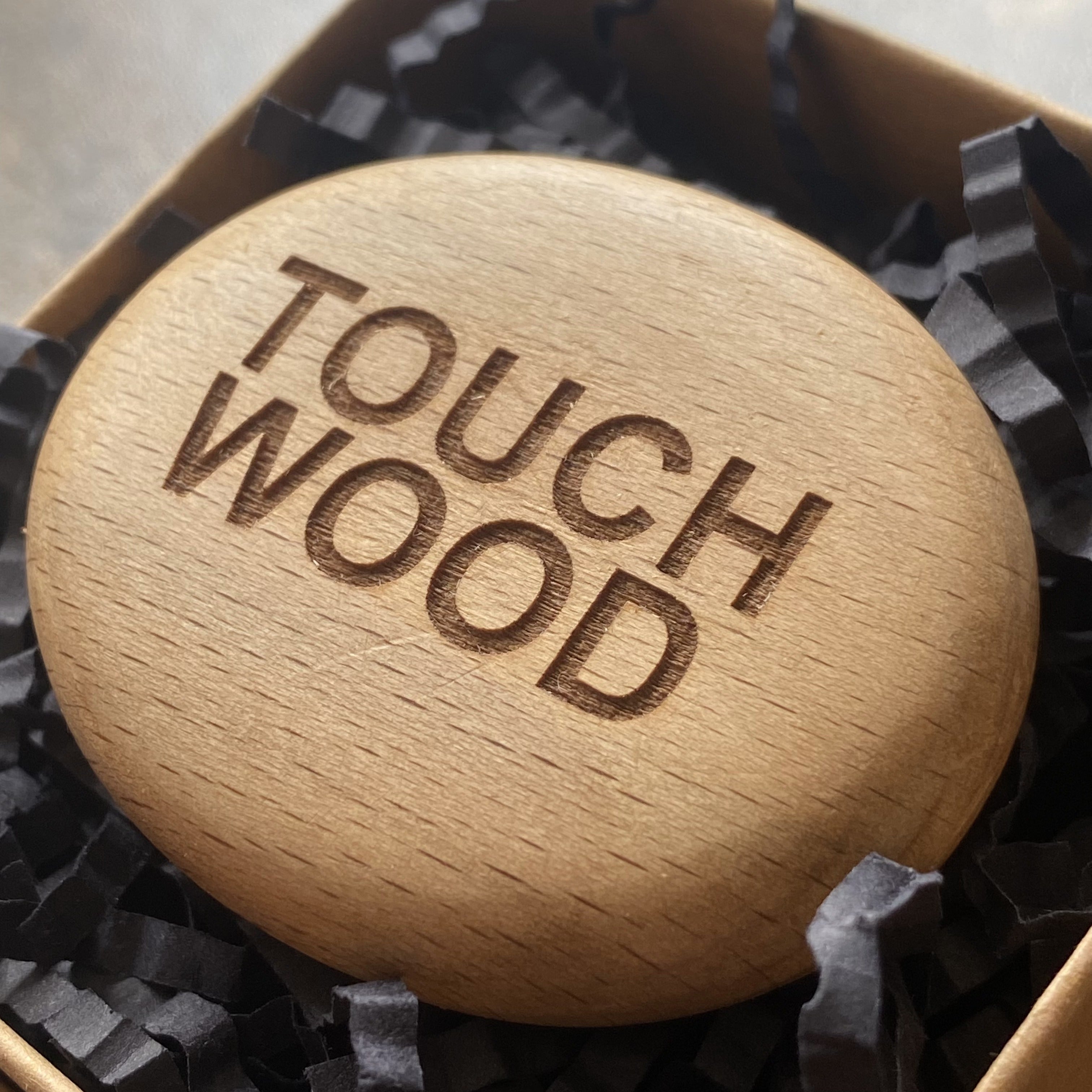 Touch Wood’ engraved wooden pocket pebble – tactile good luck token shown in gift-ready presentation box