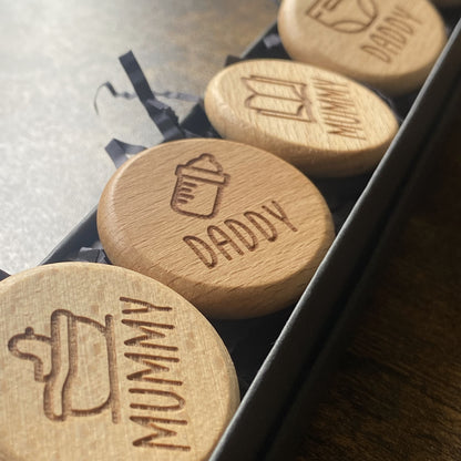 Close-up of New Baby Duties Flip Coin Set in its presentation box, beautifully arranged and ready for gifting.