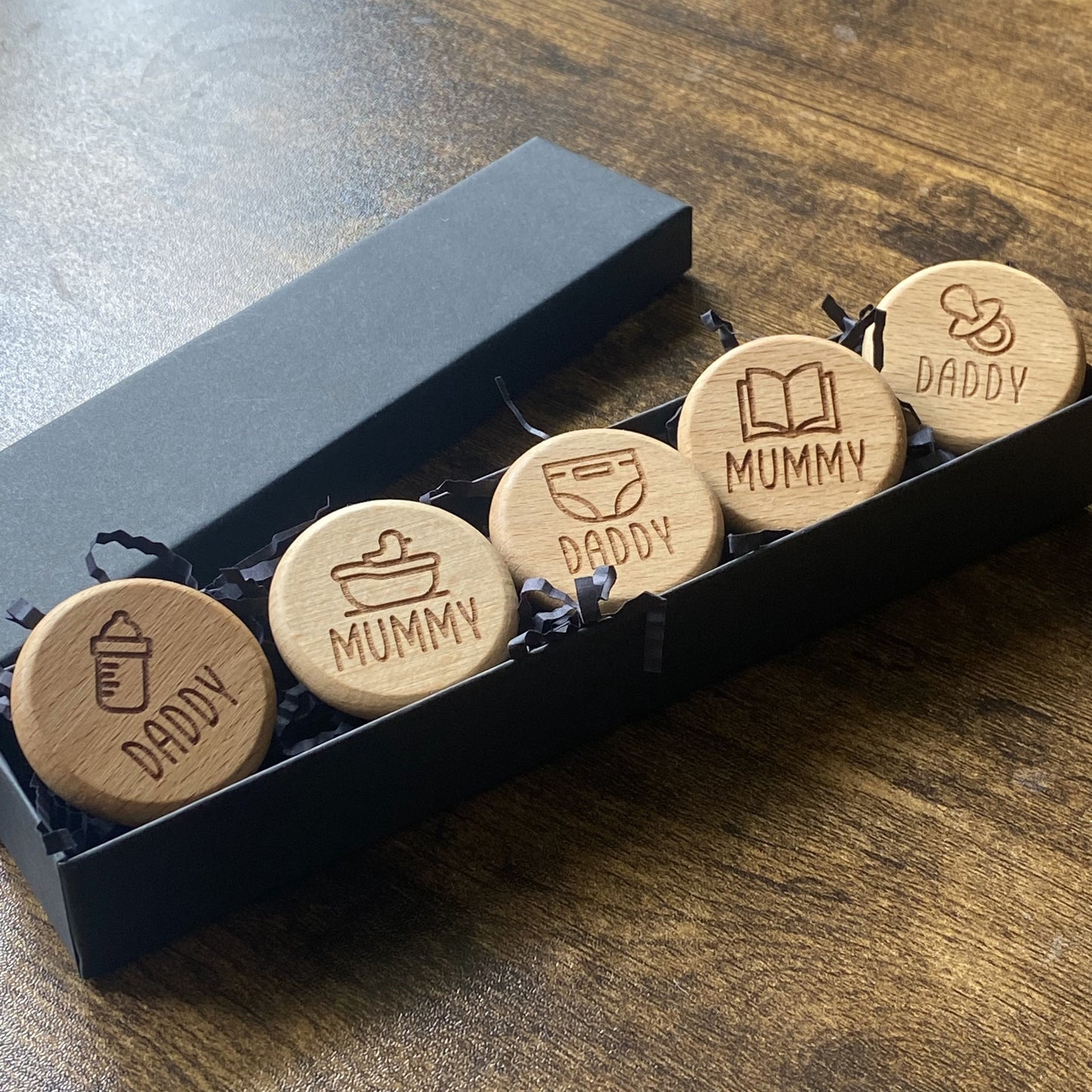 Full image of the New Baby Duties Flip Coin Set, presented in its stylish presentation box, ready for gifting