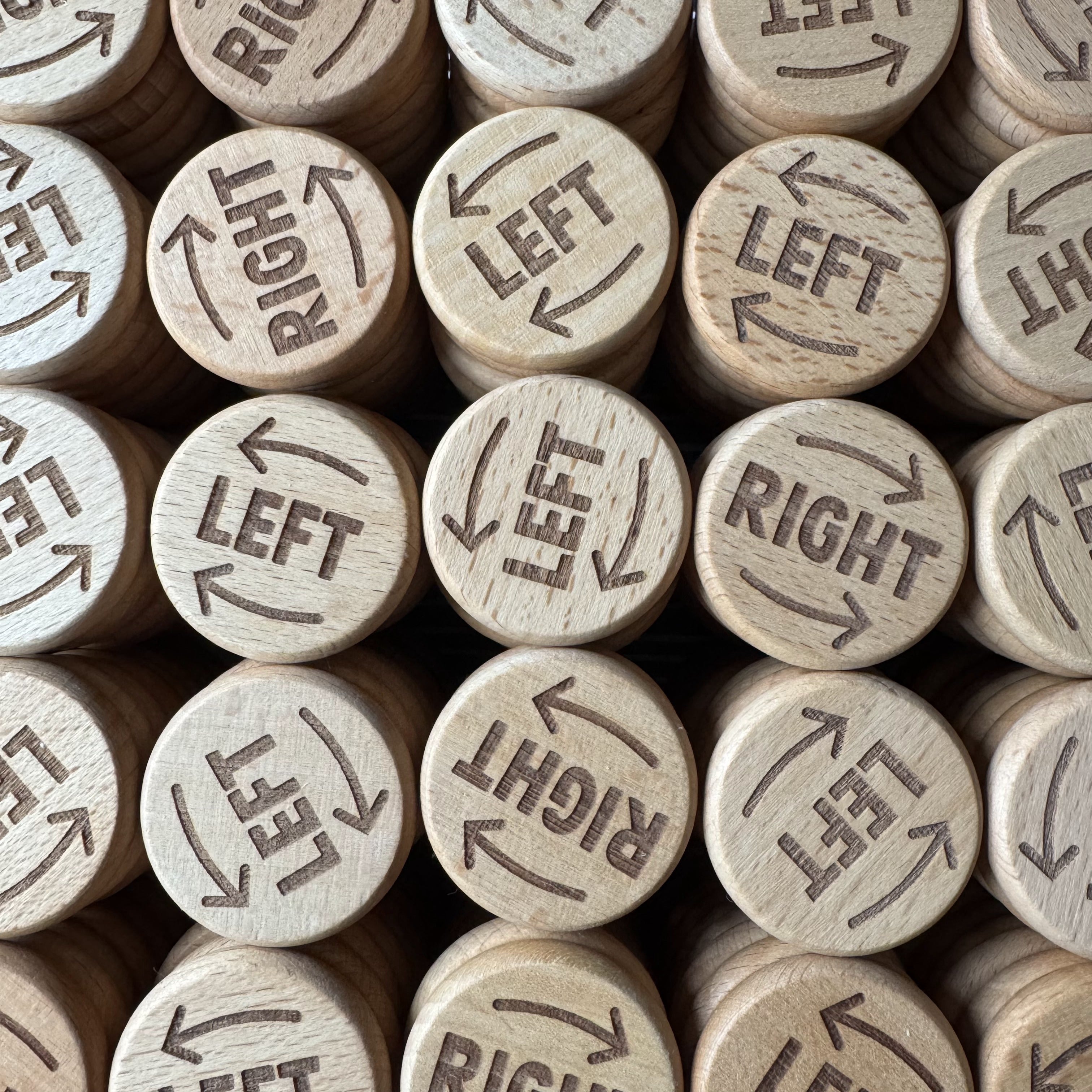Batch of custom penny hike flip coins created for client marketing promotion, showcasing engraved designs and branded font detail