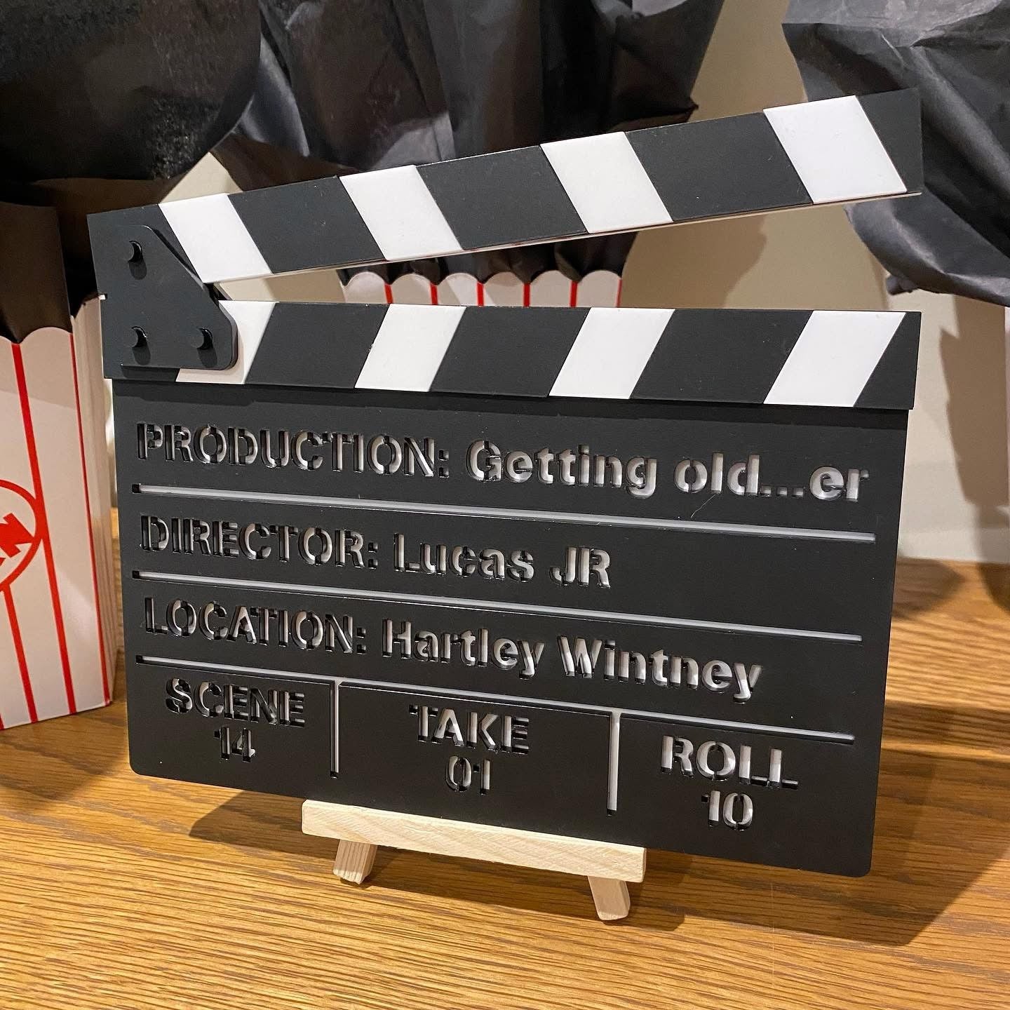 Personalised clapperboard-themed party event decoration sign, ideal for film or Hollywood-style events