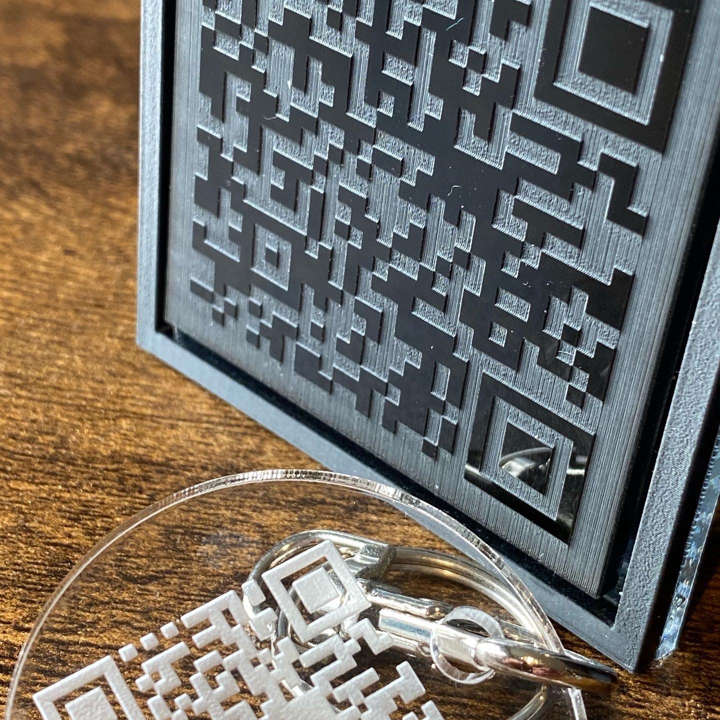Small business keyring and display plaque featuring engraved QR code for easy scanning