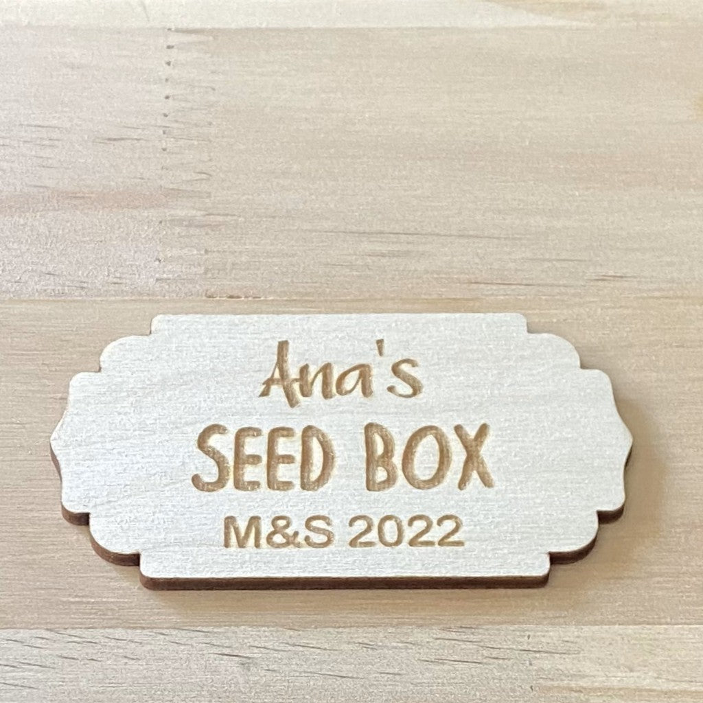 Engraved wooden plaques designed for seed boxes, perfect for gardening gifts