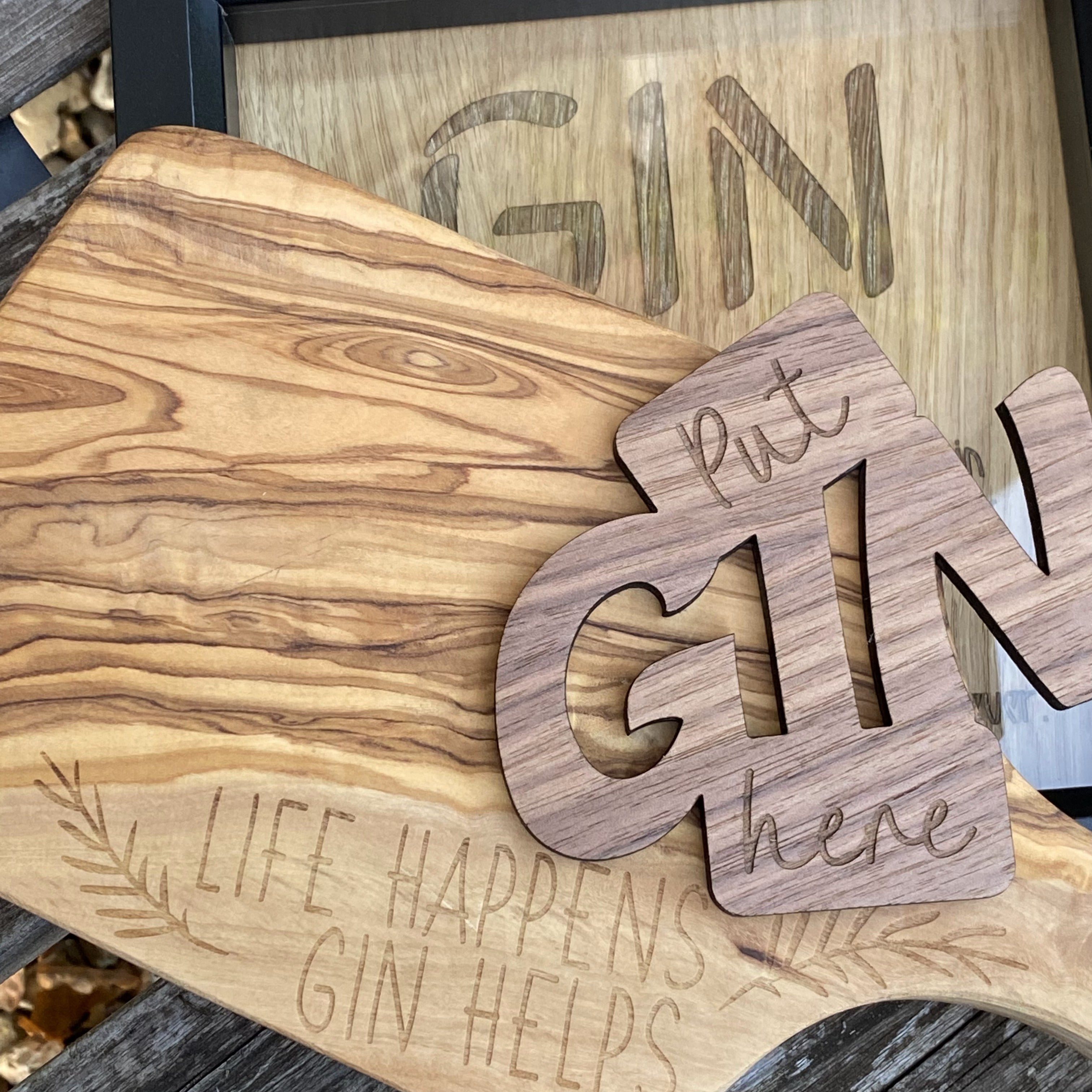 Selection of engraved wooden gin-themed gifts, perfect for gin lovers and special occasions
