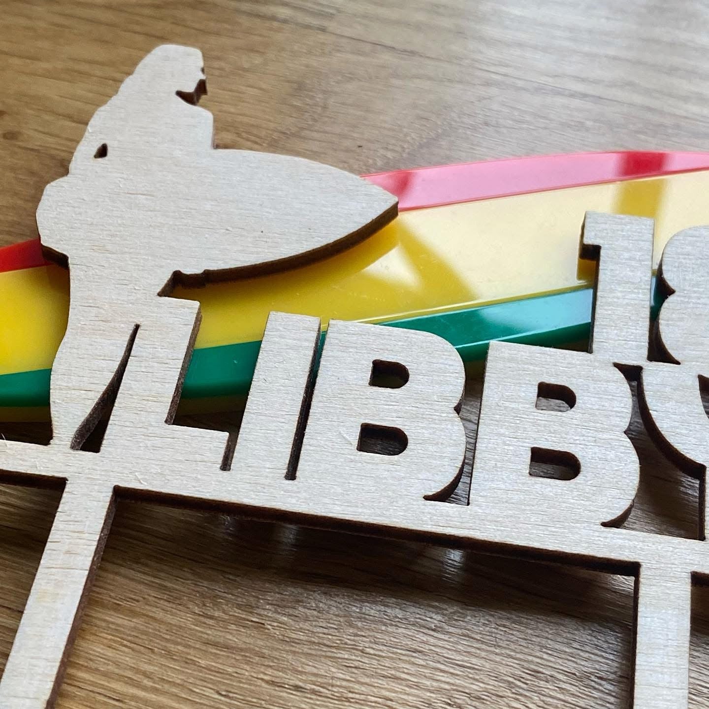 Custom cake topper in silhouette style, designed from a personal photo for a unique finish