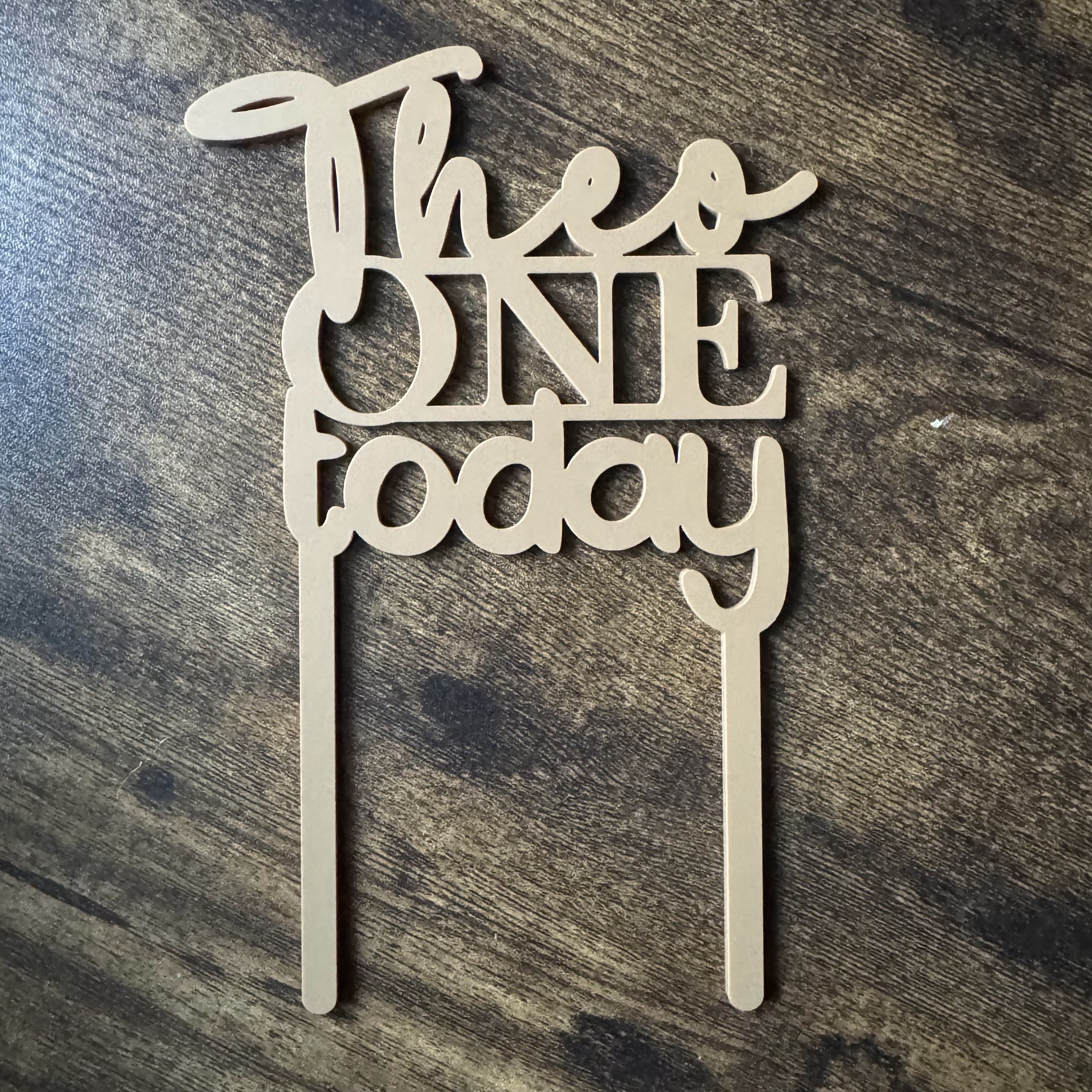 Personalised acrylic cake topper featuring typography based on client's original handwriting design