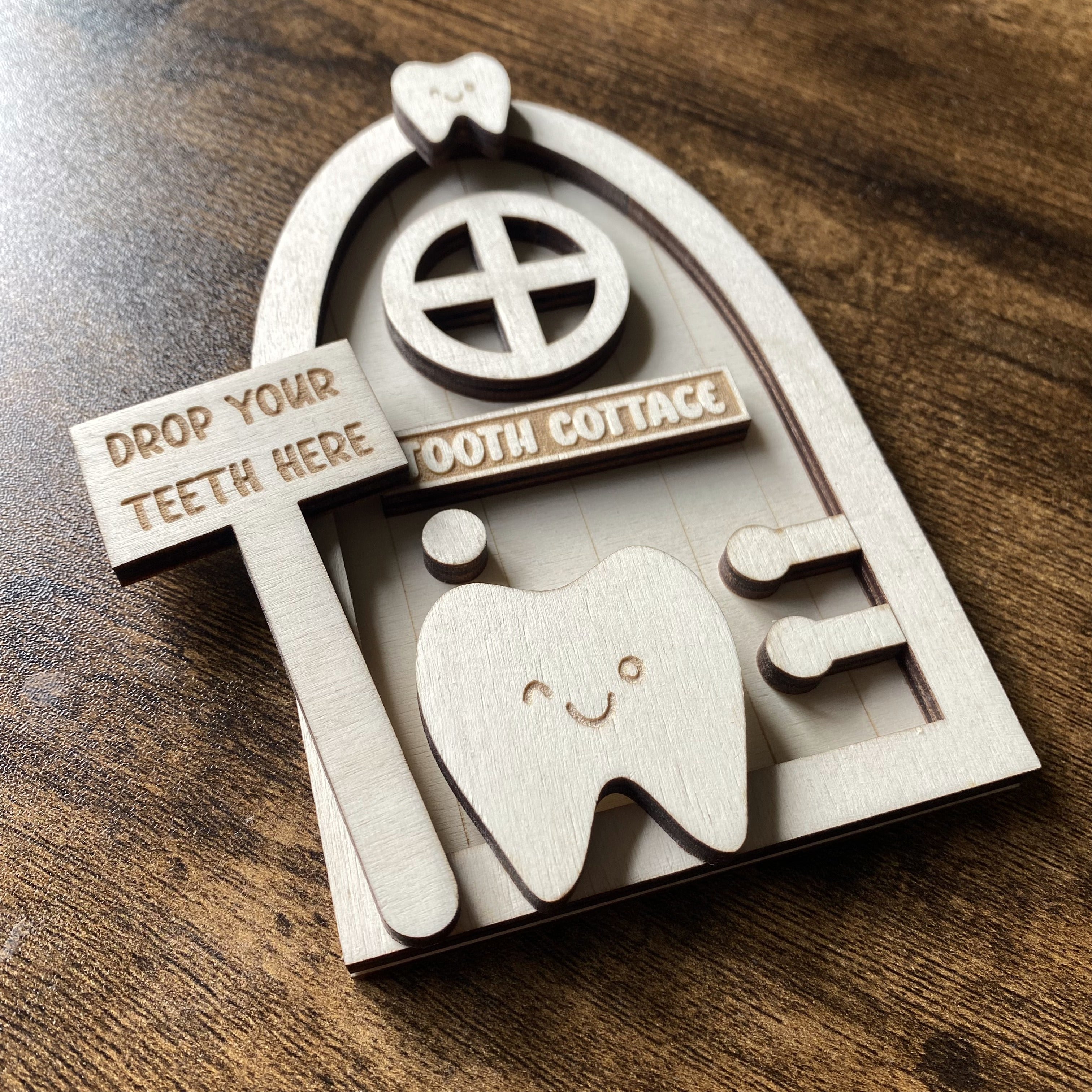 Whimsical wooden tooth fairy door designed for magical bedtime traditions