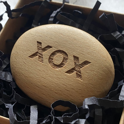 XOX wooden pocket pebble in presentation box – modern engraved symbol of hugs and kisses from the Love Edition
